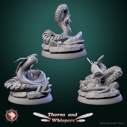 Blooming Coilspawn set of three 32mm worm monster miniatures with lamprey maws on rocky bases