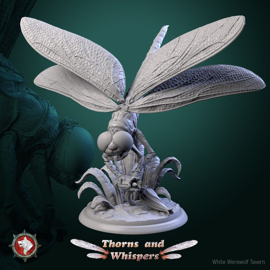 Dragonfly Model 3, 32mm dragonfly miniature head-down in a grass tuft with wings raised