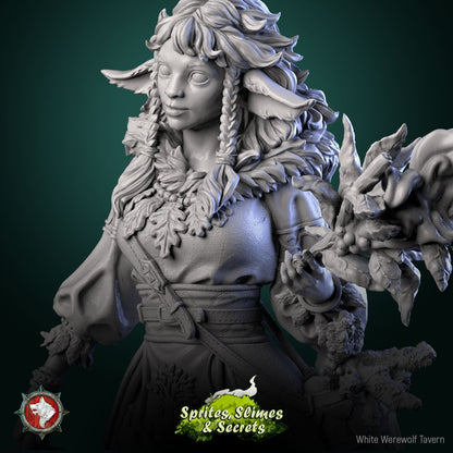 Render of Shael Silverheart | 32-75mm Forest Warden Miniature: Fawn-eared forest warden with leaf-flame staff, berry basket, and lantern, from White Werewolf's Sprites, Slimes and Secrets. 32-75mm resin miniature.