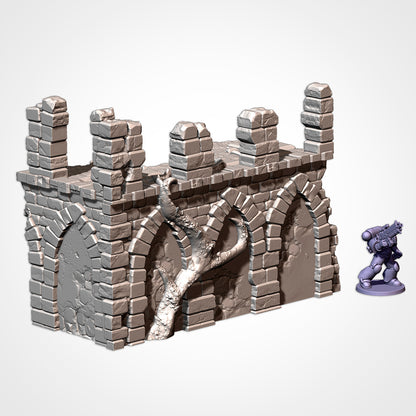 Corner Ruin 8x4in A: two-storey gothic ruin beside a 32mm figure (Txarli Factory render)