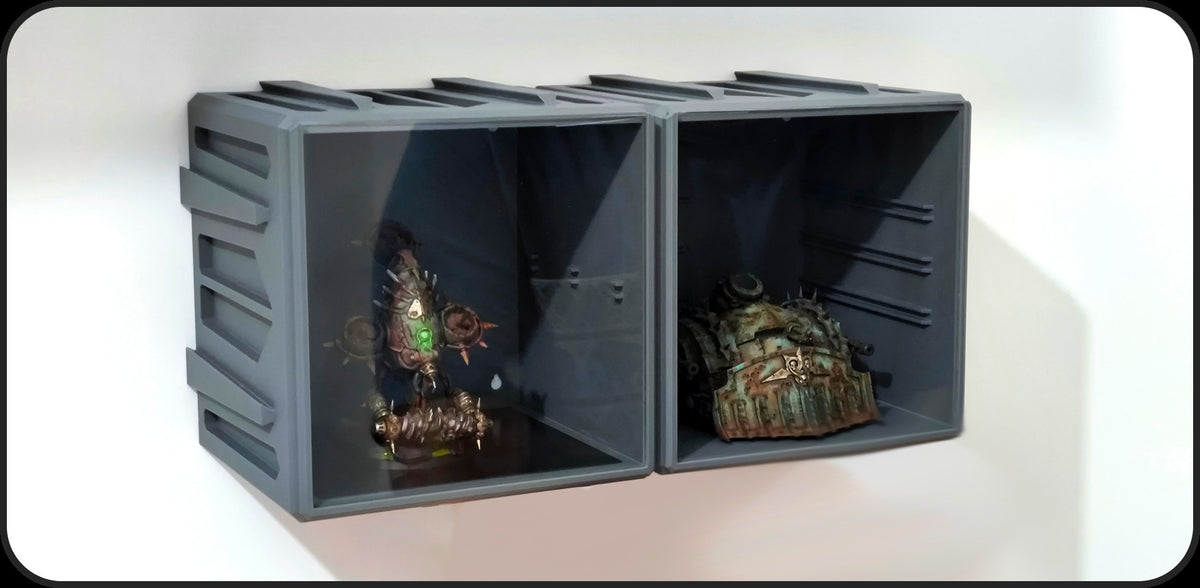 Two printed open display cubes wall-mounted, showing the shelf rails inside (Txarli Factory photo)