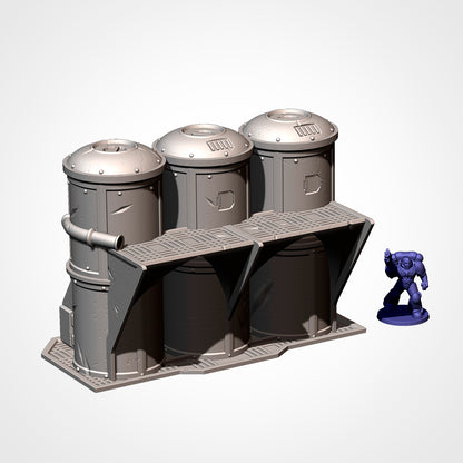 Industrial Sector silo bank beside a 32mm miniature, sci-fi terrain.