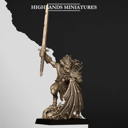Ghoul King, crowned ghoul lord with a notched greatsword over a skull pile, front three-quarter view, resin miniature by Highlands Miniatures