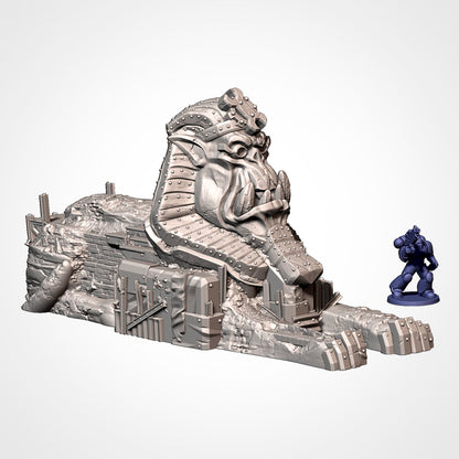 Orc Sphinx: orc-headed sphinx in a riveted headdress beside a 32mm figure (Txarli Factory render)